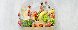 Top view paper bag of different fresh health food