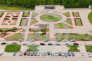 Top view of parking with parked cars