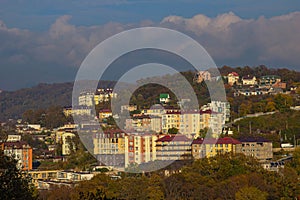 Top view of a part of the city and the mountains