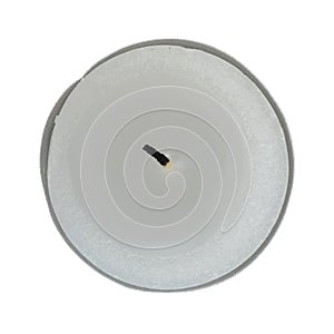 Used tea light on a white background