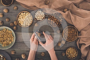 Person cracking walnut