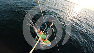 Top view of a person kiting along the river