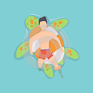 Top view persone floating on air mattress in swimming pool. Men relaxing and sunbathing on inflatable ring turtle shape photo
