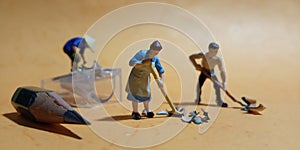 Top View, Photo 2 man and 1 woman cleaning trash from pencil sharpener with negative space