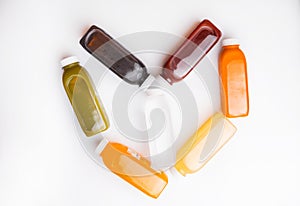 Top view photo of different detox juice bottles, antioxidant and daily vitamins you need