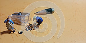 Top View, Photo man and woman cleaning trash from pencil sharpener with negative space