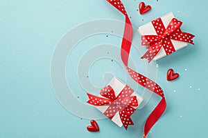 Top view photo of st valentine`s day decorations white gift boxes with red bows small hearts curly ribbon with heart pattern and