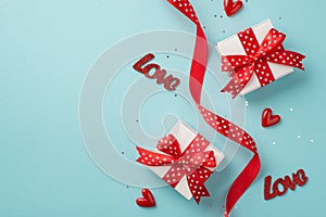 Top view photo of valentine`s day decorations white gift boxes with red bows small hearts inscriptions love curly ribbon with