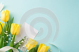 Top view photo of woman`s day composition paper card bouquet of yellow tulips white gypsophila and white ribbon on isolated paste