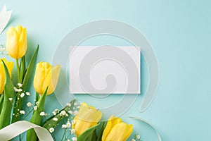 Top view photo of woman`s day composition paper sheet bunch of yellow tulips white gypsophila and white ribbon on isolated pastel