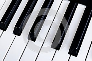 Top view of piano keys. Close-up of piano keys. Close frontal viTop view of piano keys. Close-up of piano keys. Close frontal view