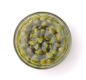 Top view of pickled capers in glass bowl