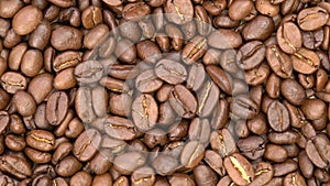 Top view pile of coffee beans rotate anticlockwise.