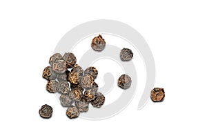 Top view pile of dried natural black pepper seeds on white background