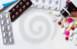 Top view of the pills on the white background, Pack of tablet drug and capsule pills on the floor,