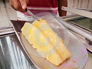 Top view of pineapple for sale on street food.