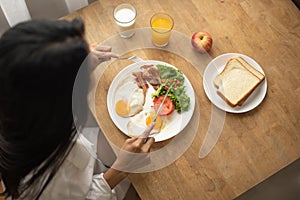 Top view of platter of fried eggs and bread on the table on the table providing a quick and easy source of protein