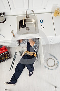 Top view of plumber in workwear