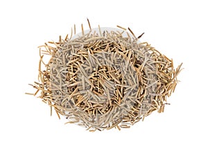 Top view of a portion of rosemary whole leaf culinary spice isolated on a white background