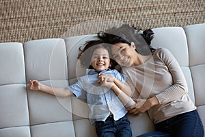 Top view portrait happy Asian mother and son on couch