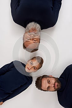 Top view portrait of three male generations