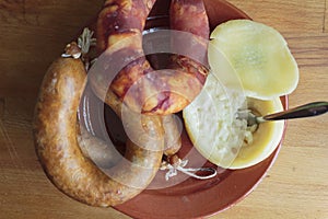Top view of portuguese cheese from Azeitao and traditional smoked sausages photo