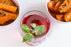 Top view of potato gravy or Dum Aloo an Indian curry and Sangria Kokum fruit punch with mint isolated on white background