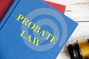 Top view of Probate law book with gavel on white background. Probate law concept