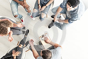 Top view of a psychotherapist working with a group of difficult