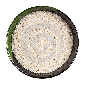 Top view of psyllium husk in round bowl isolated