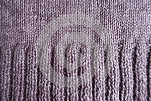 Top view of puce knitted fabric with ribs photo