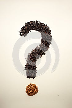Top view question mark from coffee and tea on the white background