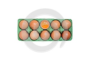 Top view of raw brown chicken eggs in egg carton box isolated on white background