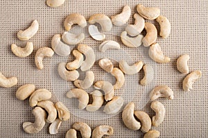 Top view on raw cashew nuts scattered on the table