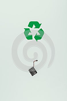 top view of recycle sign and accumulator