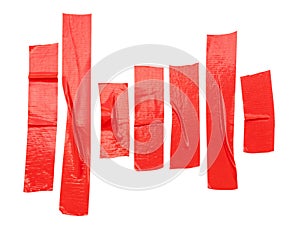 Top view of red adhesive vinyl or cloth tape stripes in set isolated on white background with clipping path