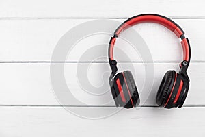 Top view of red amd black headphone on white background