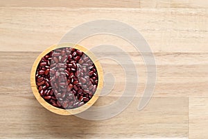 Top view of red beans in a bowl on wooder background, Healthy eating concept