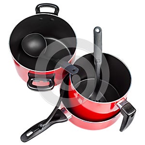 Top view of red cooking pans and pots