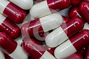 Top view of red, white, capsule pills