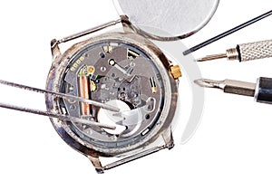 Top view of replacing battery in quartz watch