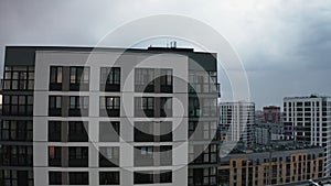 Top view of residential area with different houses. Stock footage. Modern area with residential multi-storey buildings