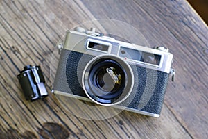 Top View of Retro Film Camera with Film