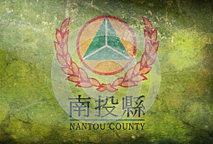 Top view of retro flag of Nantou, County with grunge texture. People\'s Republic of China