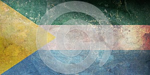 Top view of retro flag San Vicente de Caguan, Caqueta Colombia with grunge texture. Colombian patriot and travel concept. no photo