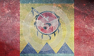 Top view of retro flag of Stoney Nakoda Nation, Canada with grunge texture. Canadian travel and patriot concept. no flagpole.