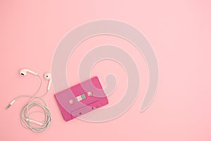 Top view of retro tape cassette with earphone