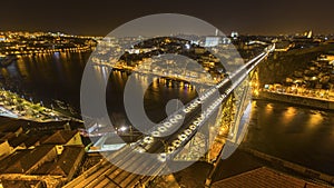 Top view of Ribeira and Douro river at night time in Porto
