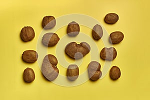 Top view of ripe kiwis isolated on a yellow background