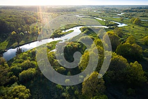 Top view river nature. Aerial view of Green summer meadow with river